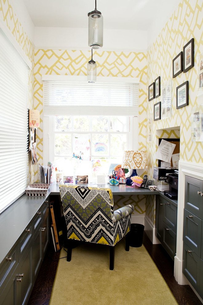 Inspiration for a small transitional built-in desk study room remodel in Jacksonville with multicolored walls and no fireplace