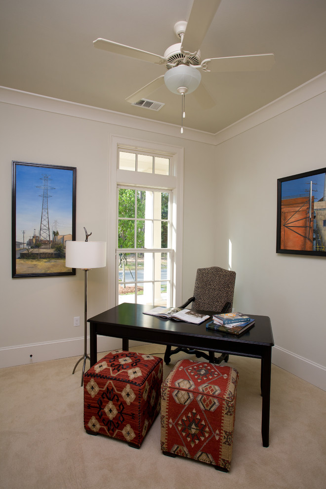 Design ideas for a medium sized classic study in New Orleans with beige walls, carpet and a freestanding desk.
