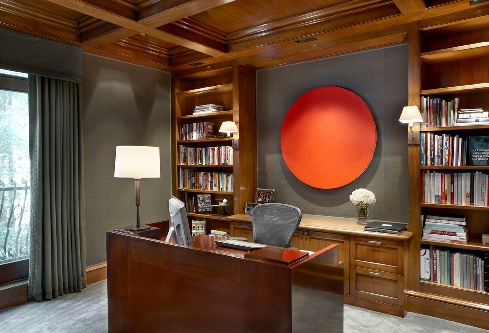 Photo of a traditional home office in Chicago with carpet and grey walls.