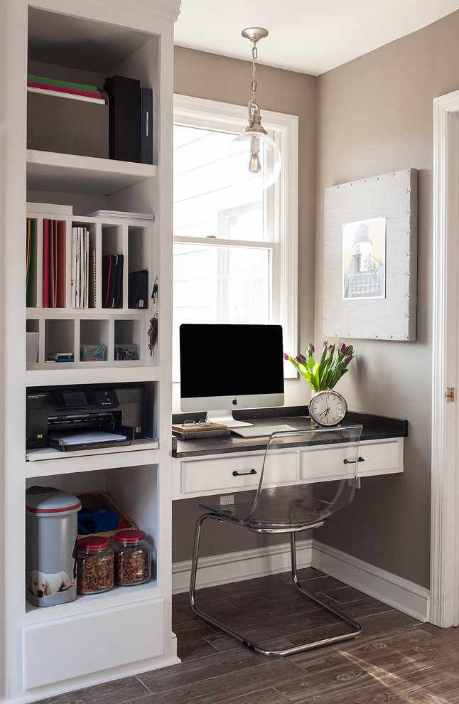 Mid-sized transitional built-in desk ceramic tile home office photo in New York with gray walls
