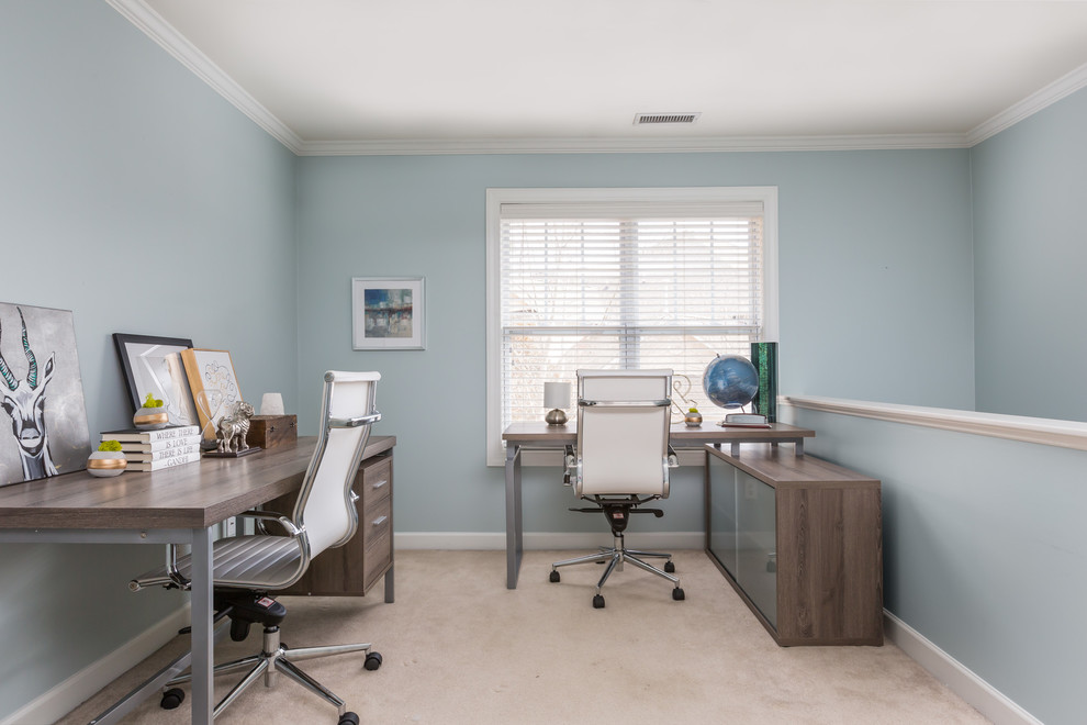 Mid-sized elegant freestanding desk carpeted study room photo in Raleigh with blue walls and no fireplace