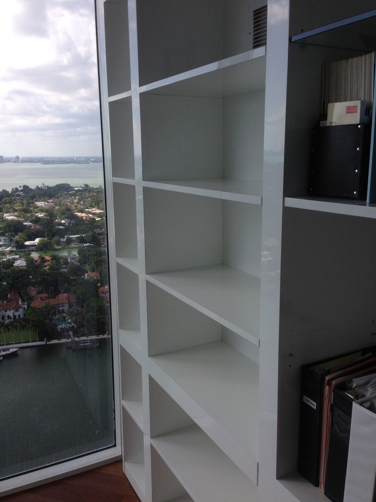 Acrylic wall unit with pivoting section to hide master bedroom Modern