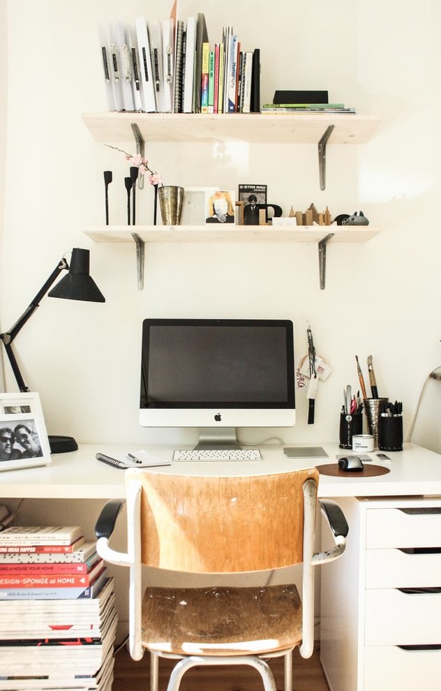 Example of a trendy home office design in Amsterdam