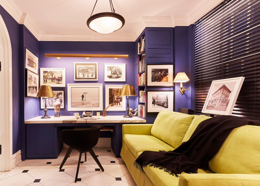 На фото: рабочее место среднего размера в стиле неоклассика (современная классика) с синими стенами, мраморным полом, встроенным рабочим столом и разноцветным полом без камина с