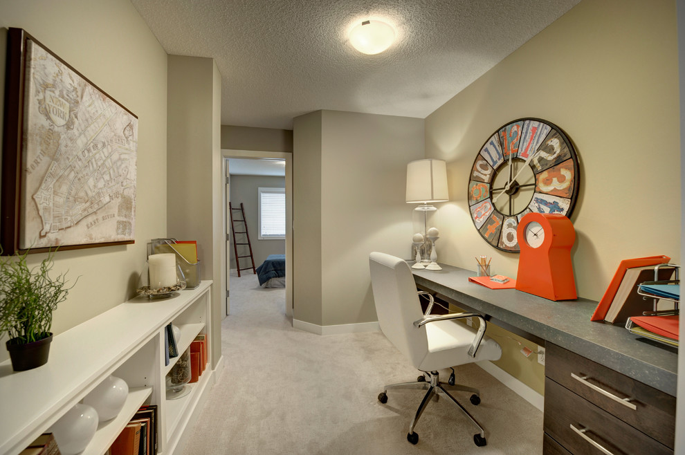 Design ideas for a small classic home office in Edmonton with beige walls and carpet.