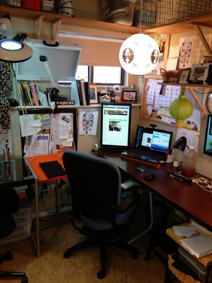 Example of a small eclectic freestanding desk carpeted home studio design in Chicago with no fireplace