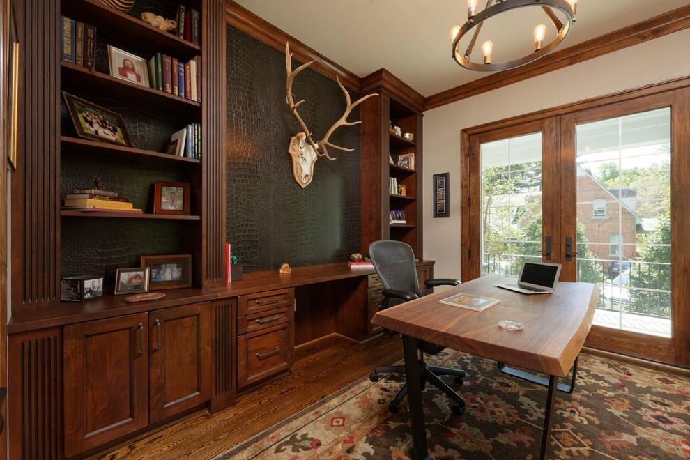 Inspiration for a large rustic freestanding desk dark wood floor and brown floor study room remodel in DC Metro with beige walls and no fireplace
