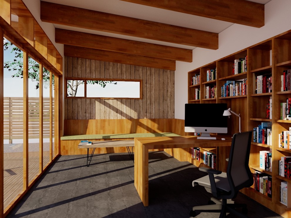 Пример оригинального дизайна: маленький кабинет в стиле модернизм с бетонным полом и встроенным рабочим столом для на участке и в саду