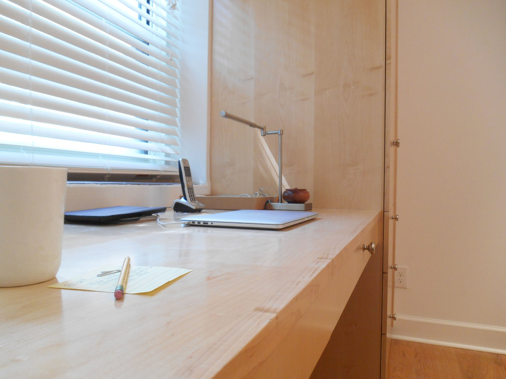 This is an example of a small contemporary home office in Philadelphia.