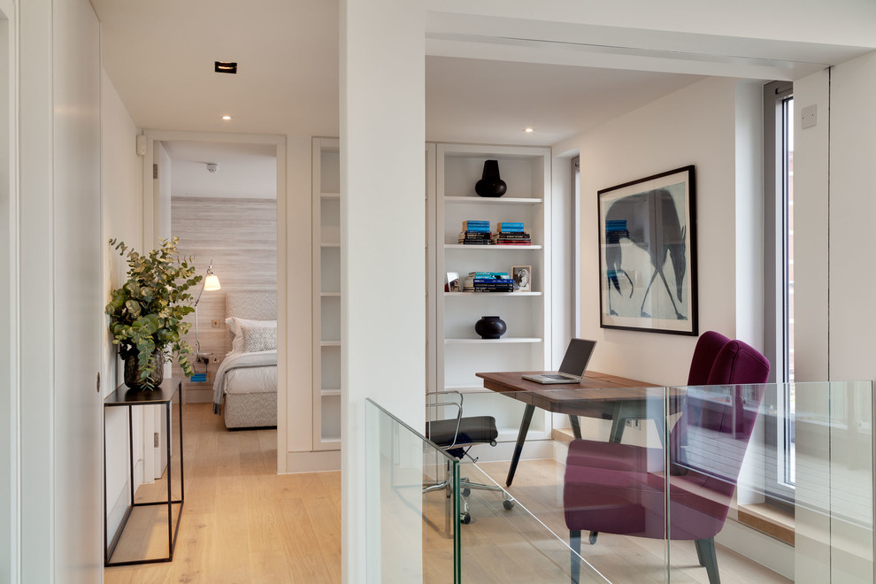 This is an example of an expansive modern home office in London.