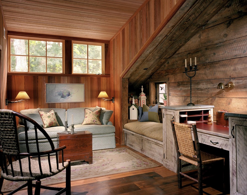 Study room - large traditional built-in desk medium tone wood floor study room idea in Philadelphia with no fireplace