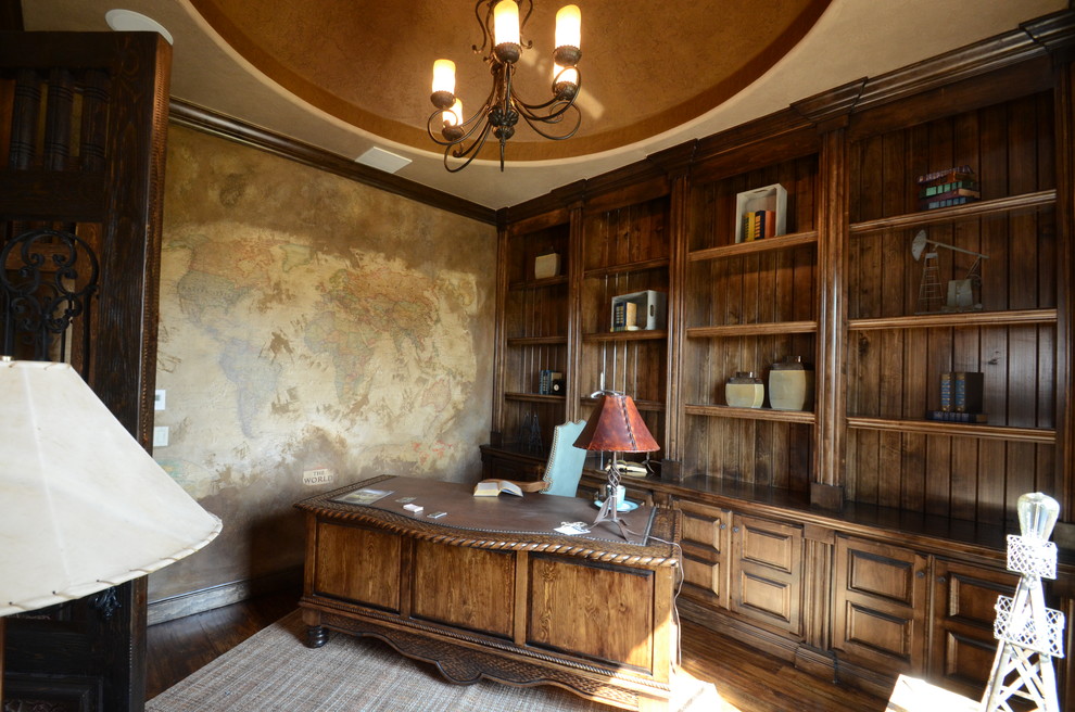Home studio - traditional freestanding desk medium tone wood floor home studio idea in Oklahoma City with beige walls