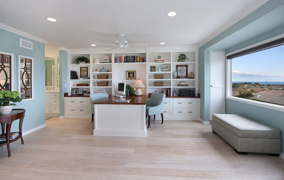 Example of a beach style home office design in Orange County