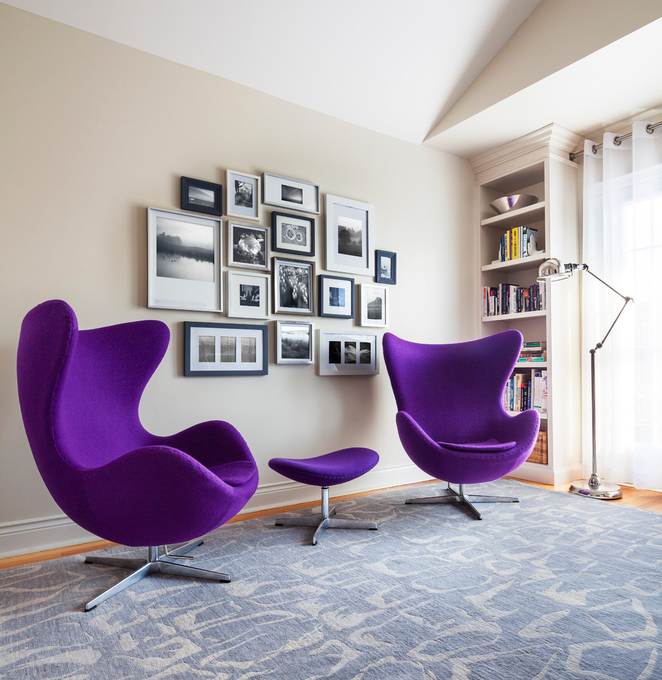 Mid-sized transitional medium tone wood floor study room photo in Toronto with beige walls