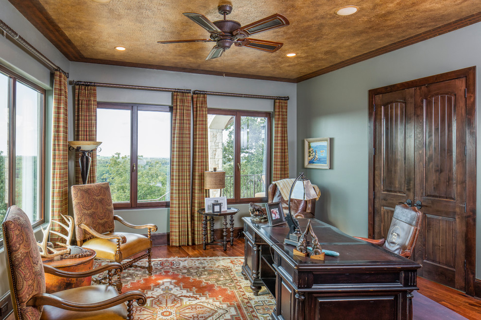 This is an example of a mediterranean home office in Austin.