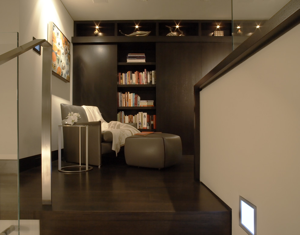 Example of a minimalist dark wood floor home office design in Orange County with white walls
