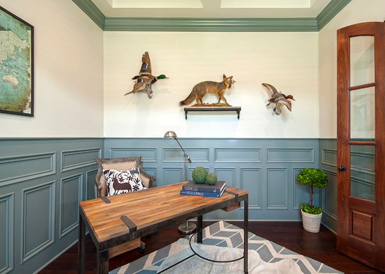 Mid-sized eclectic freestanding desk dark wood floor home office photo in Louisville with beige walls
