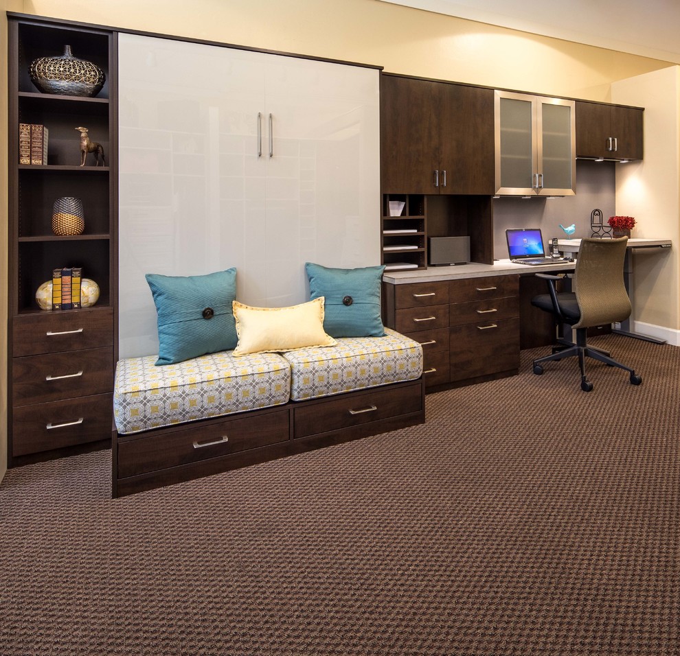 Medium sized contemporary study in San Francisco with beige walls, carpet, no fireplace and a built-in desk.