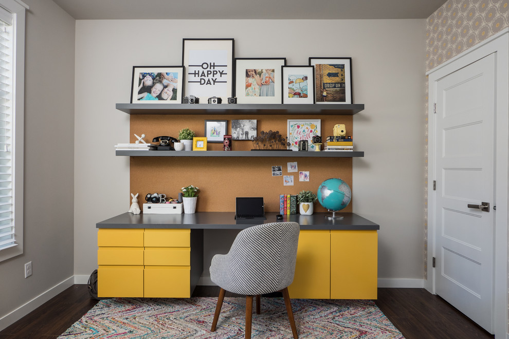 Design ideas for a contemporary study in Seattle with a built-in desk, multi-coloured walls, dark hardwood flooring and brown floors.