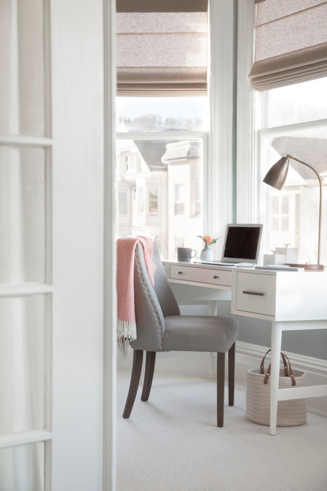 Photo of a classic study in San Francisco with white walls and a freestanding desk.