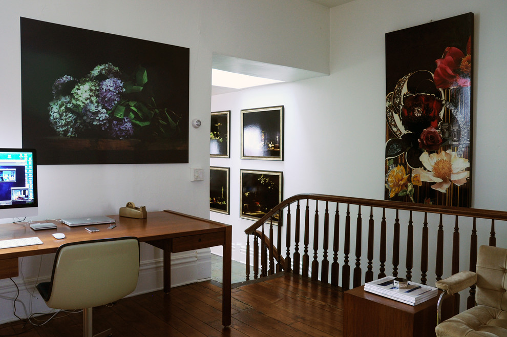 Eclectic freestanding desk dark wood floor home office photo in Other with no fireplace