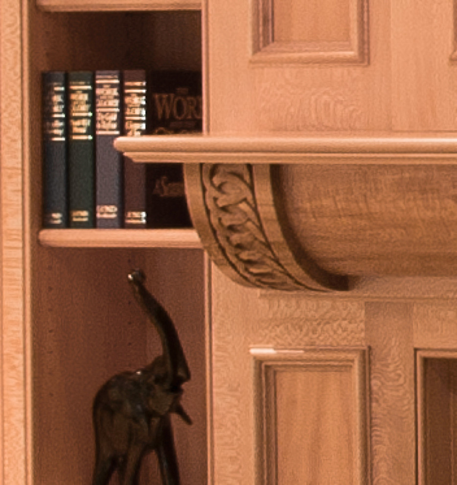 На фото: домашняя библиотека среднего размера в стиле неоклассика (современная классика) с коричневыми стенами, темным паркетным полом, стандартным камином и фасадом камина из дерева с