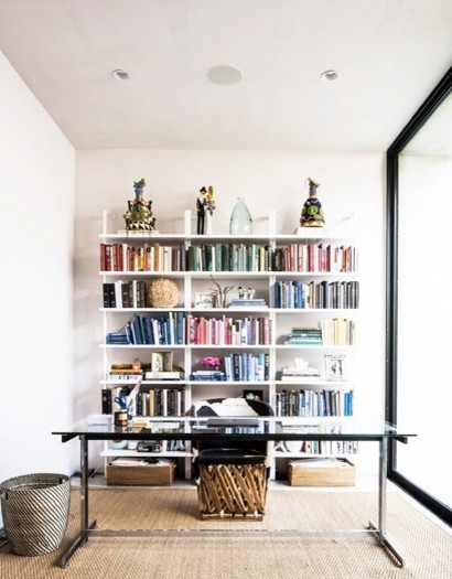 Inspiration for a mid-sized modern freestanding desk concrete floor and gray floor home office remodel in Dallas with gray walls and no fireplace