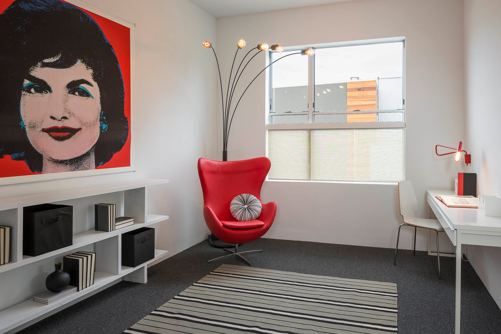 Trendy freestanding desk carpeted home office photo in San Francisco with white walls