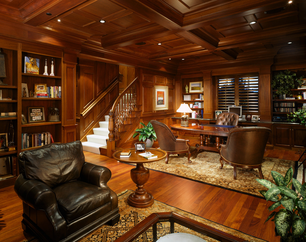 Inspiration for a huge timeless freestanding desk dark wood floor home office remodel in Denver