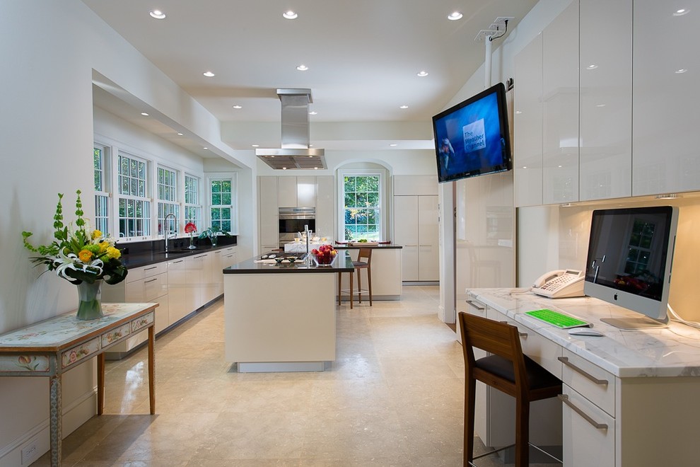 Photo of a medium sized contemporary study in Atlanta with white walls, travertine flooring and a built-in desk.