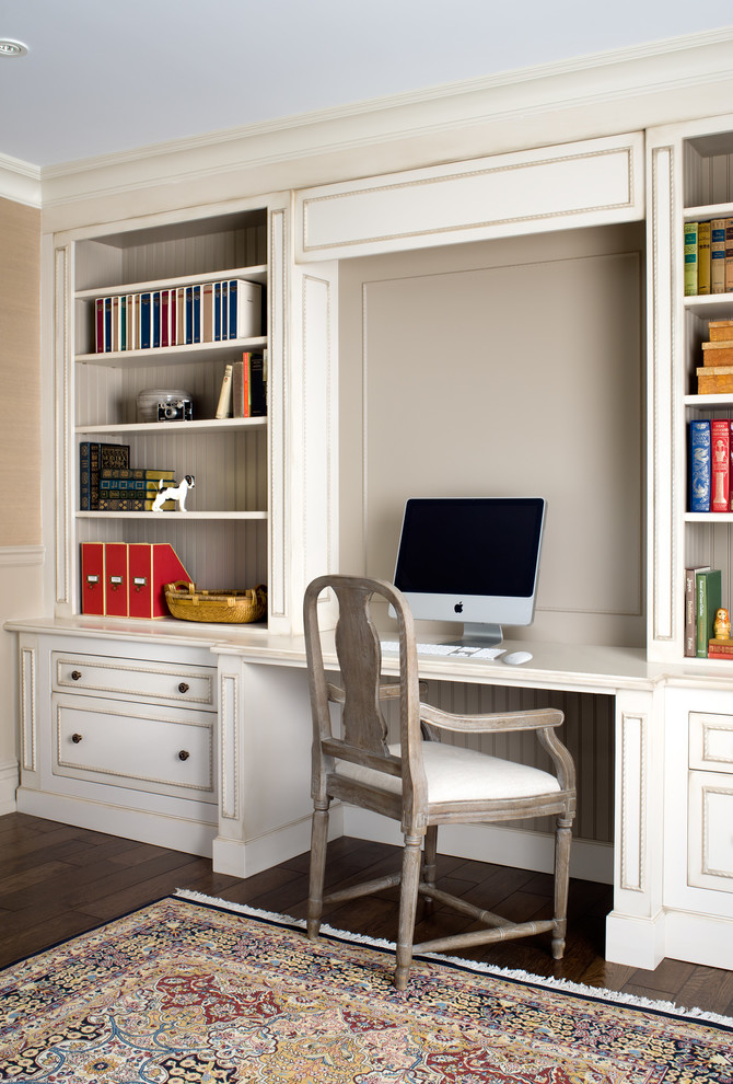 Traditional home office in Toronto with a built-in desk.