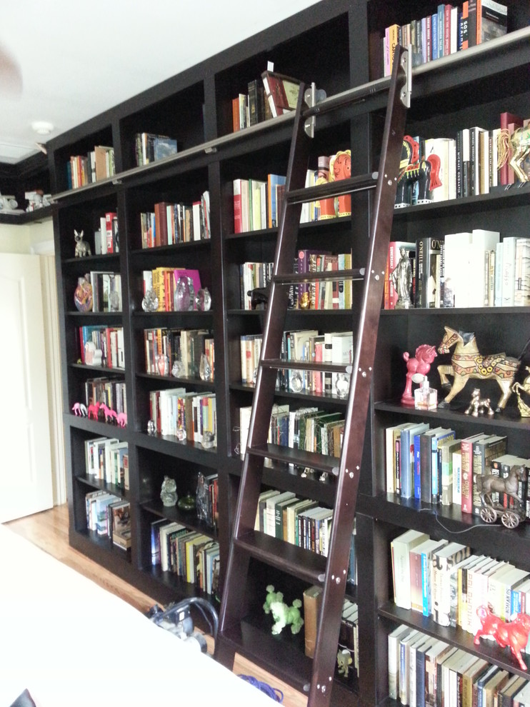 Builtin Bookcases with Rolling Ladder and Hidden Vault Traditional