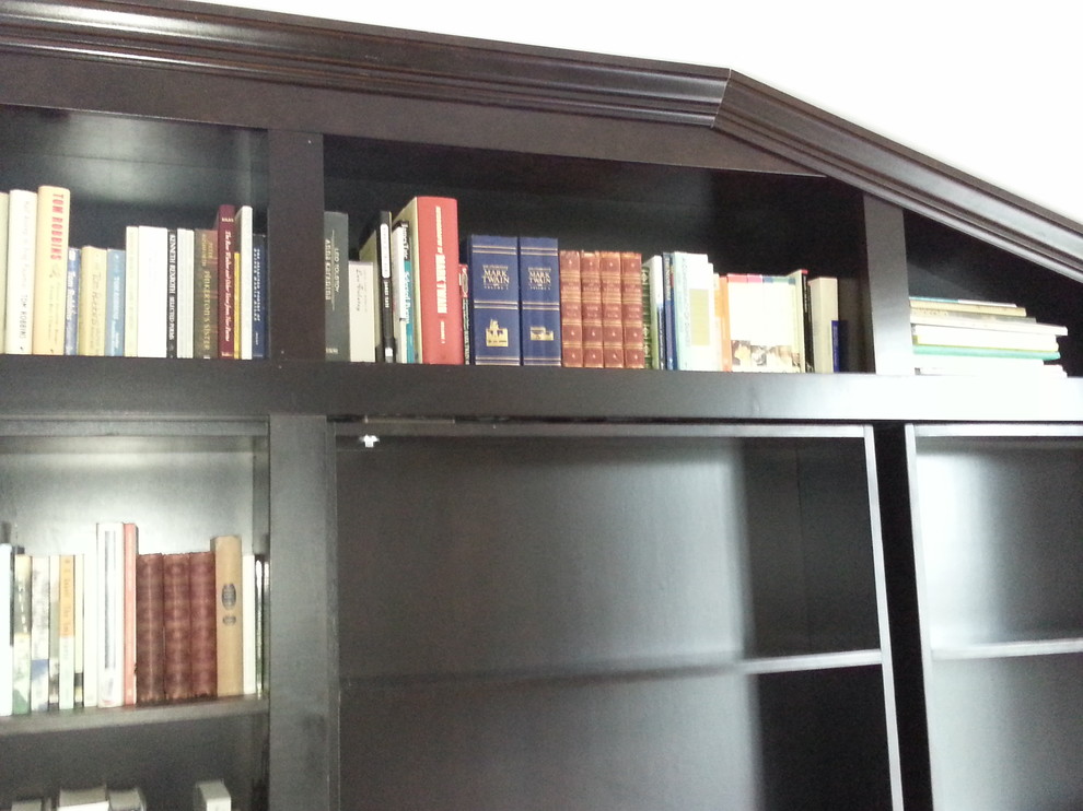 Builtin Bookcases with Rolling Ladder and Hidden Vault Traditional