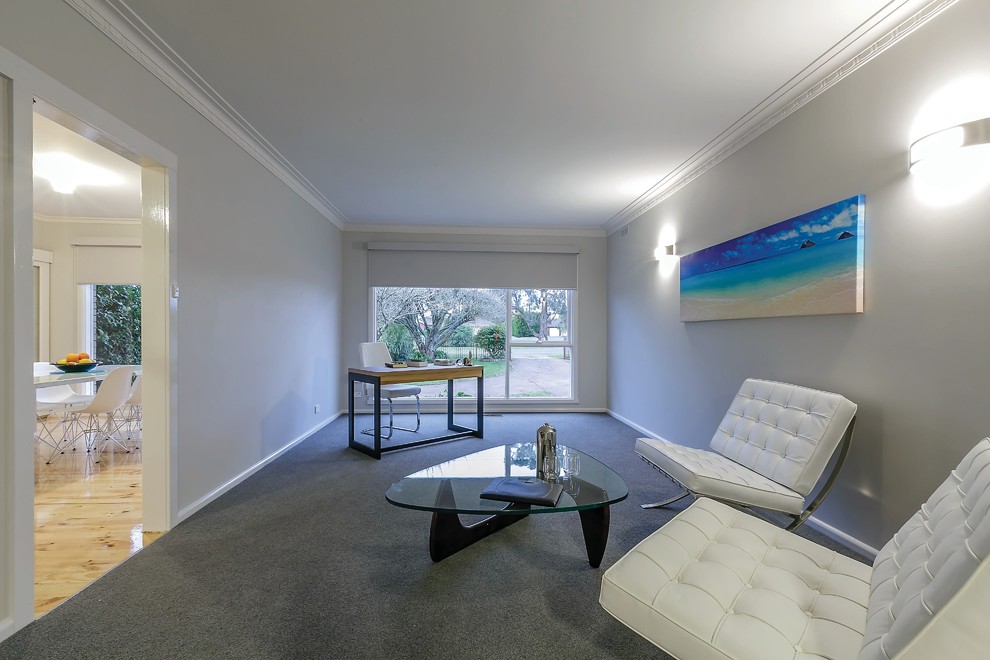 Design ideas for a large contemporary study in Geelong with grey walls, carpet and a freestanding desk.