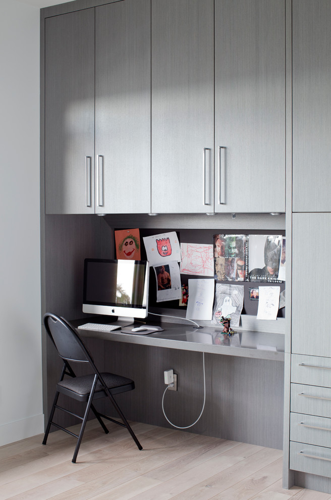 Trendy built-in desk home office photo in Vancouver