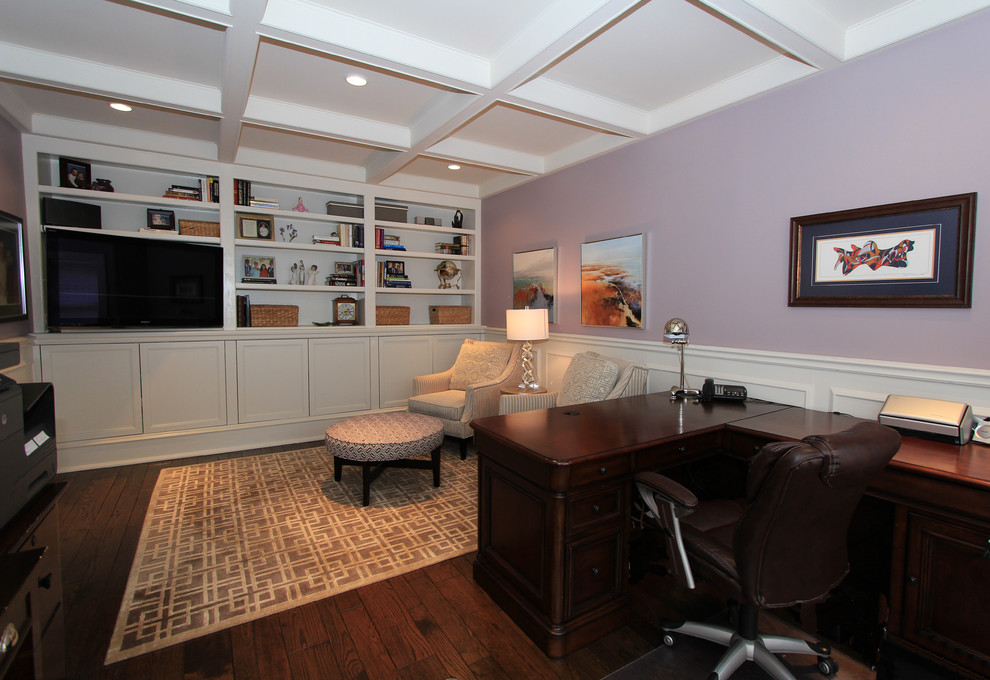Large contemporary study in Toronto with purple walls and a freestanding desk.