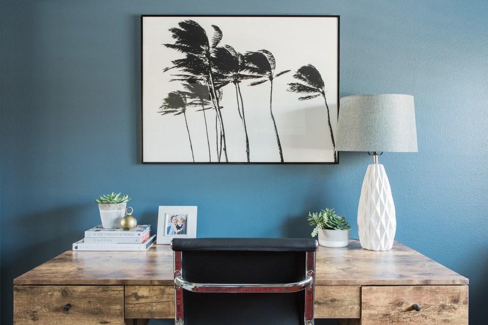 Example of a large eclectic freestanding desk carpeted and beige floor study room design in Los Angeles with gray walls and no fireplace