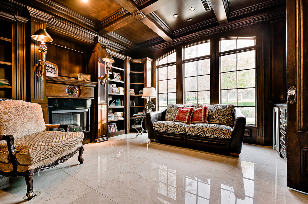 リトルロックにある高級なトラディショナルスタイルのおしゃれな書斎 (大理石の床、標準型暖炉、自立型机) の写真