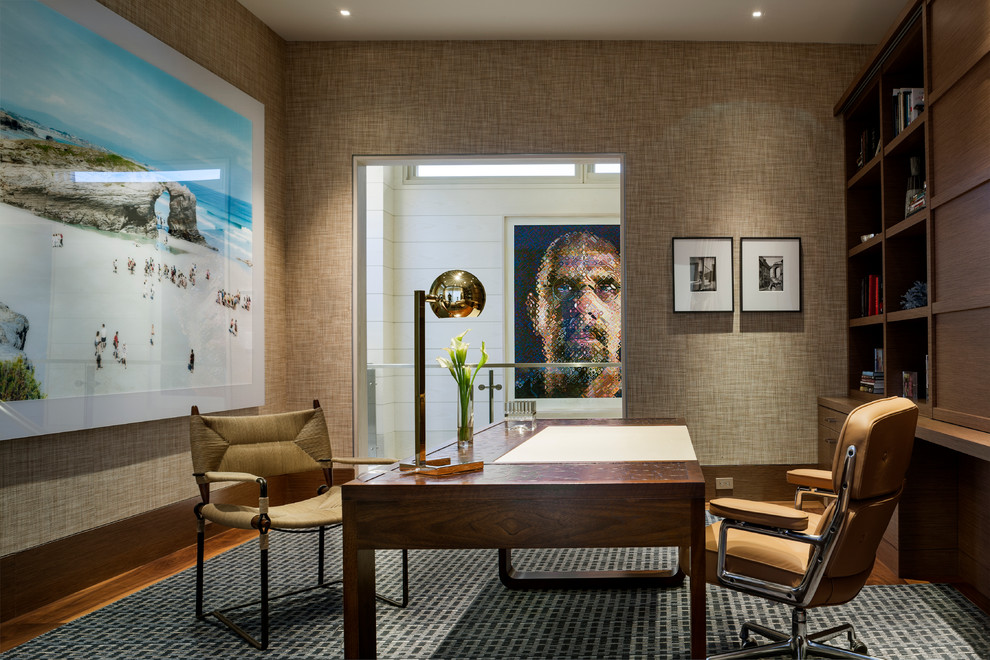 Contemporary home office in Boston with medium hardwood flooring and a freestanding desk.