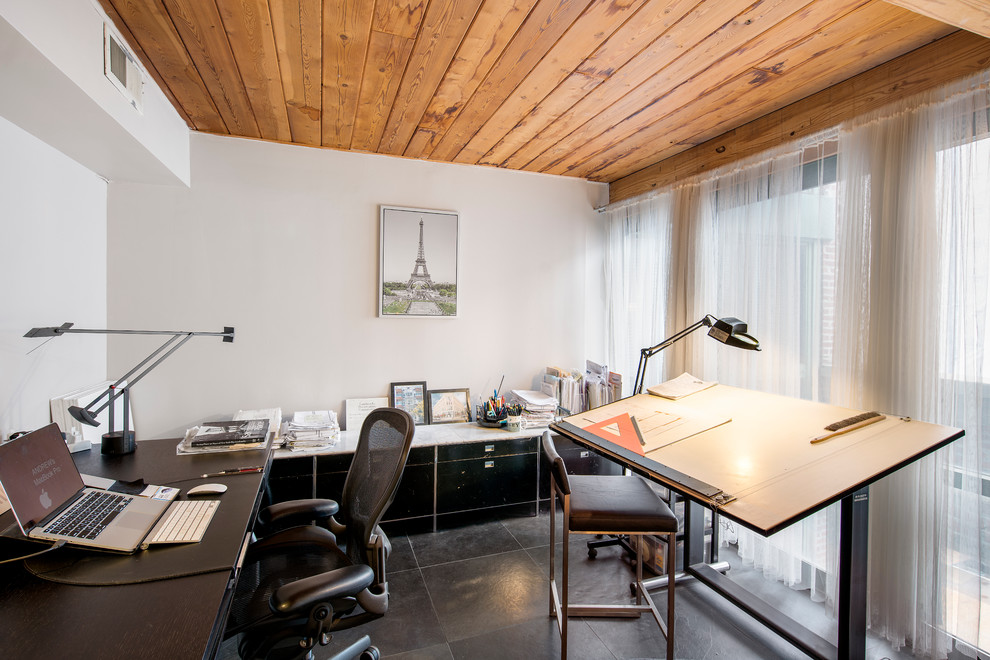 Идея дизайна: рабочее место среднего размера в стиле модернизм с белыми стенами, полом из сланца, встроенным рабочим столом и серым полом без камина