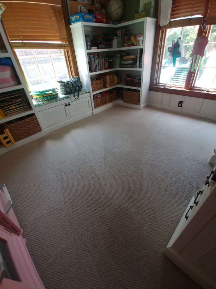 Craft room - small traditional carpeted and gray floor craft room idea in Detroit with brown walls