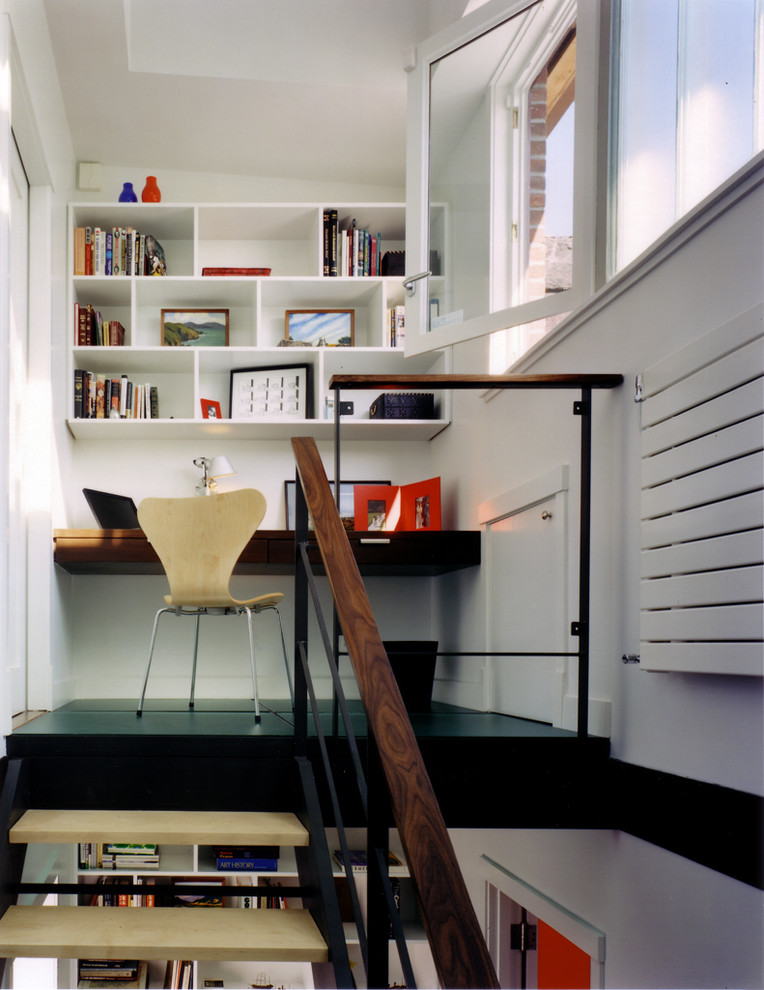 Home office - modern home office idea in New York with white walls