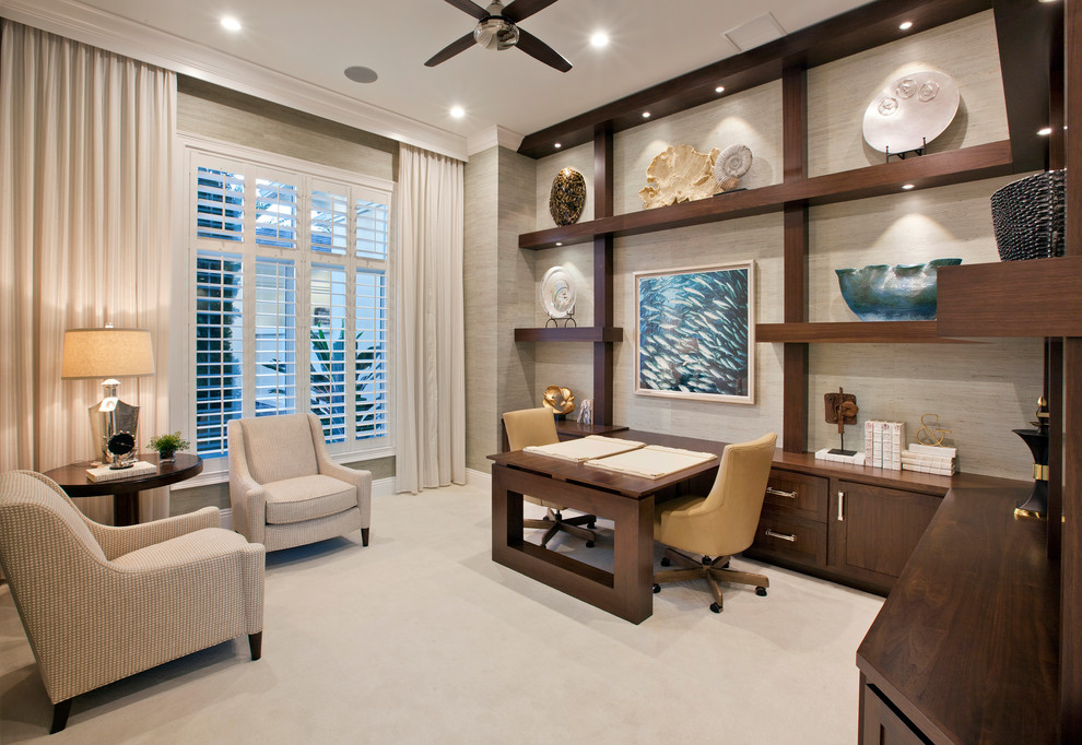 Inspiration for a nautical home office in Miami with beige walls, carpet, no fireplace and a built-in desk.