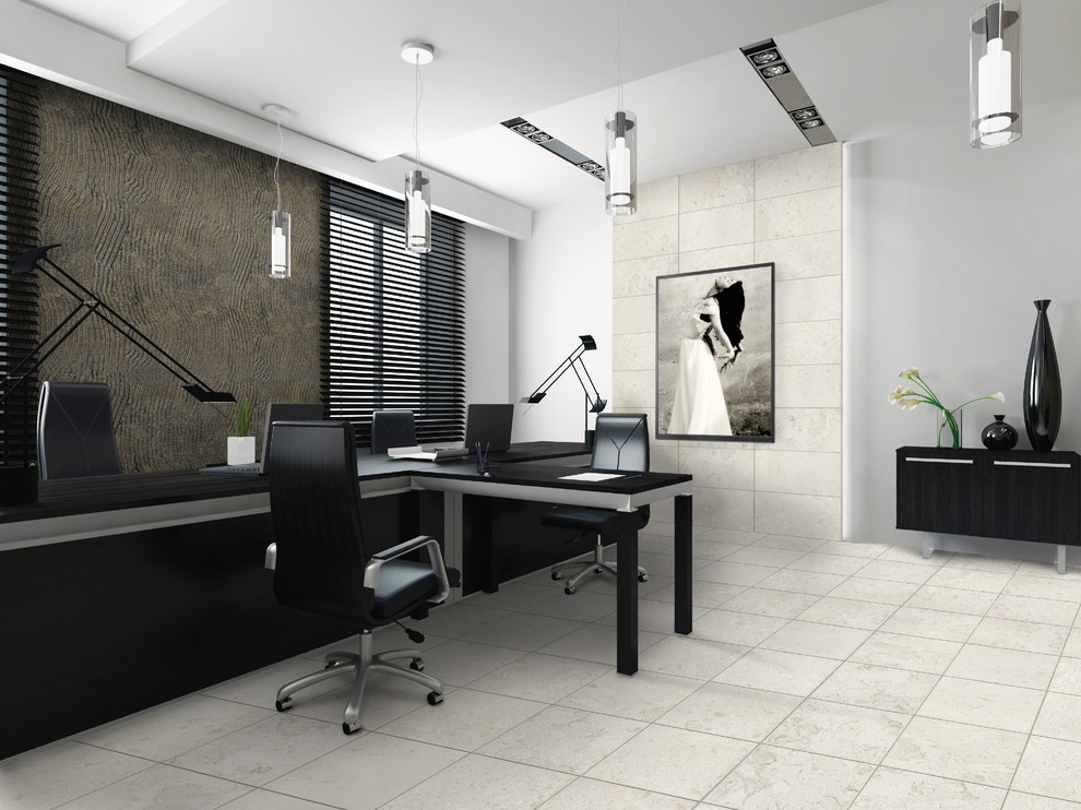 Ejemplo de despacho moderno de tamaño medio con paredes blancas, suelo de travertino y escritorio independiente