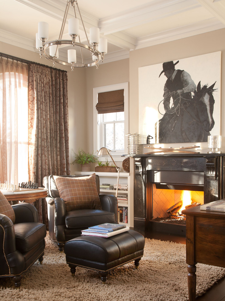 Example of a classic freestanding desk dark wood floor home office design in Denver with beige walls and a standard fireplace