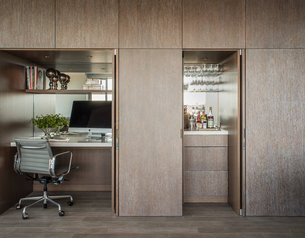 Home office wall cabinet with a hidden surprise inside