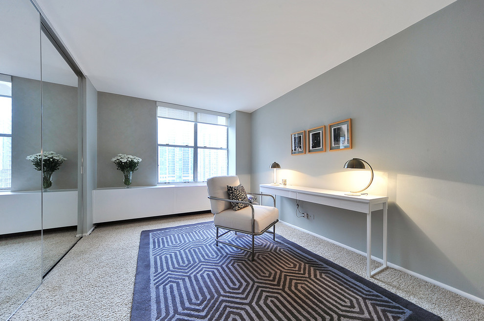 Mid-sized minimalist carpeted study room photo in Chicago with gray walls