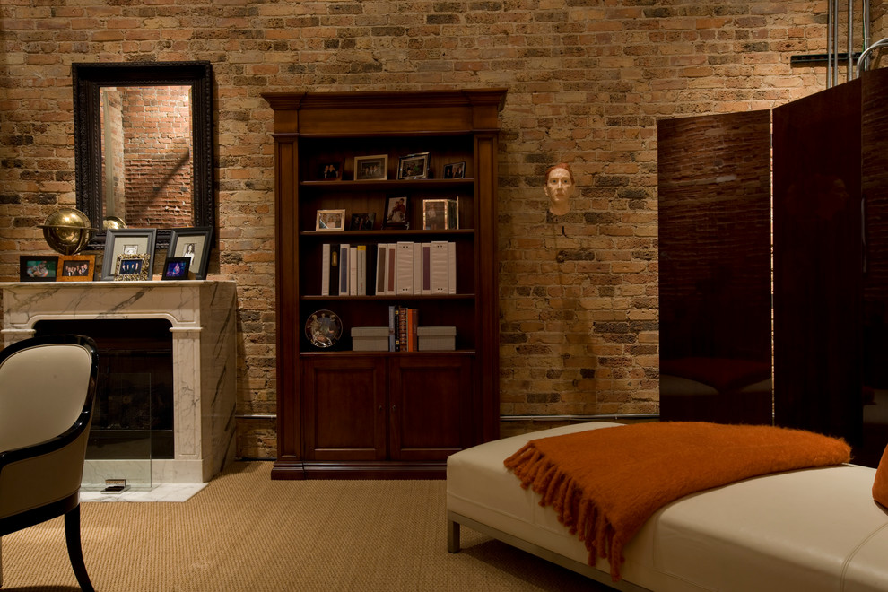 This is an example of a large industrial study in Chicago with carpet, a standard fireplace, a stone fireplace surround, a freestanding desk and beige walls.