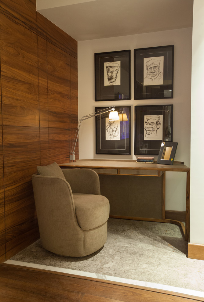 Inspiration for a small contemporary freestanding desk study room remodel in Delhi