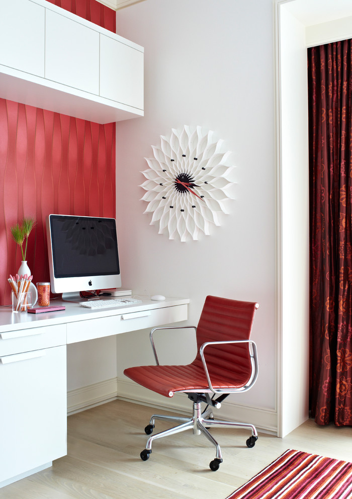 Inspiration for a mid-sized contemporary carpeted home office remodel in Chicago with white walls